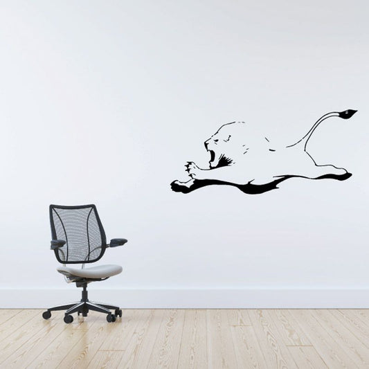 Lion leaping decal, black wall sticker with mane and paws outstretched
