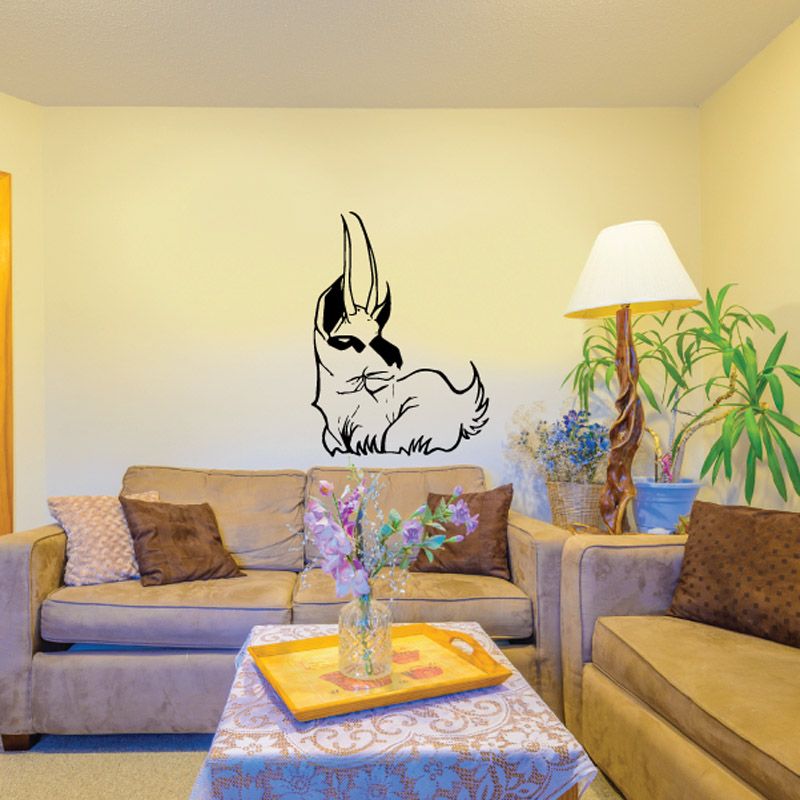 Sitting goat wall decal with long horns, black line art