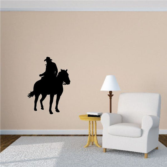 Cowboy riding horse wall decal, black silhouette