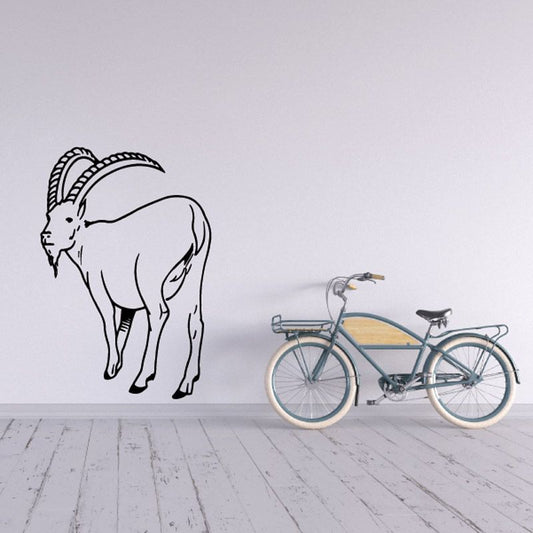 Ibex line-art decal, black outline figure with curved horns