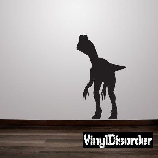 Dark dinosaur silhouette decal with spiky head and flared frill