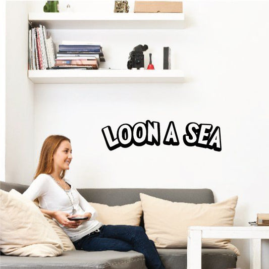 Black LOON A SEA wall decal with playful bubble lettering