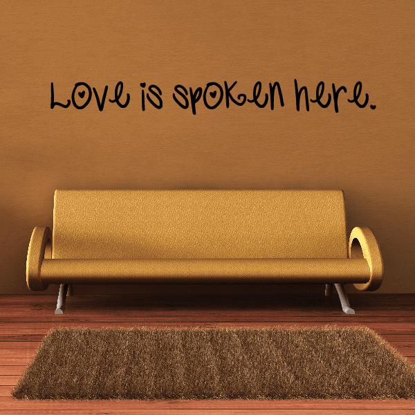 Wall decal text: “Love is spoken here.”