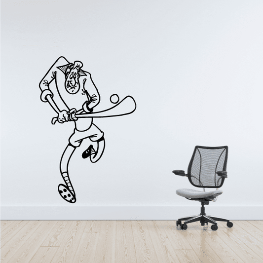 Black-and-white cartoon male field hockey player decal, holding stick and ball.