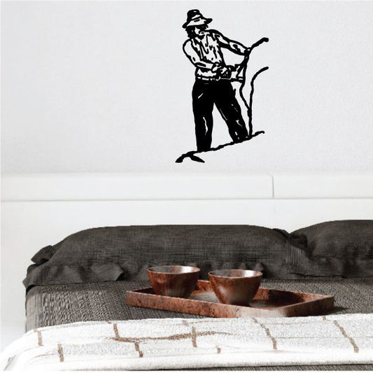 Image of Male using Chainsaw Decal