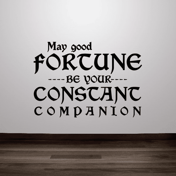 Wall decal with bold stylized text: “May good fortune be your constant companion”