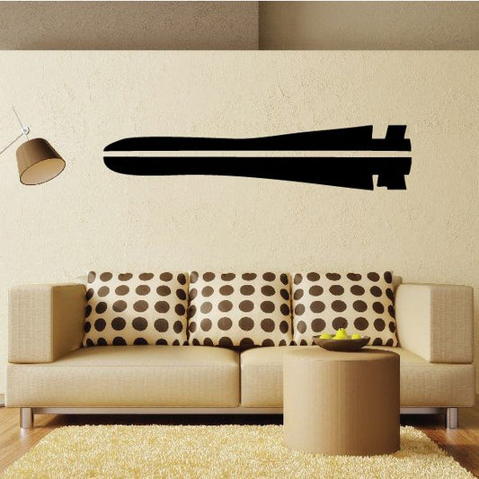 Black missile wall decal with pointed nose, fins, and small panel details