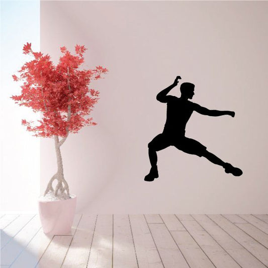MMA fighter wall decal, black vinyl silhouette of a kick pose