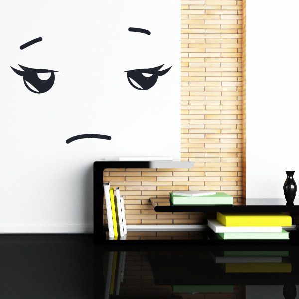 Face expression wall decal with black eyes and eyebrows on white wall
