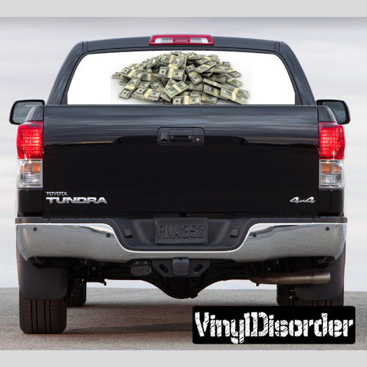Pickup truck rear window view graphic with green cash bills in the bed opening