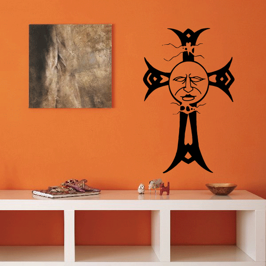 Stylized moon cross face decal with black and tan character graphic