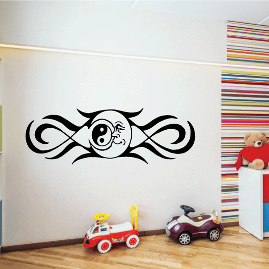 Moon and yin-yang wall decal with smiling face design in black