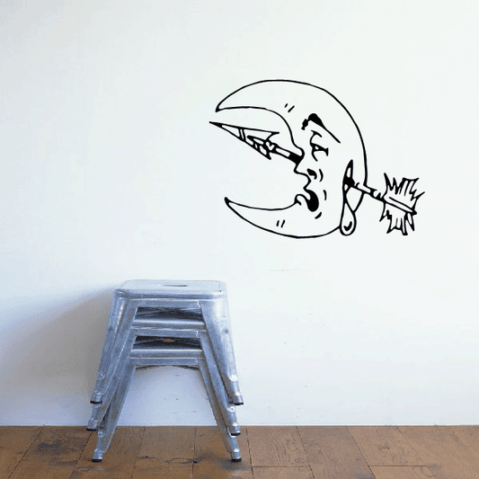 Moon and arrow wall decal with face silhouette