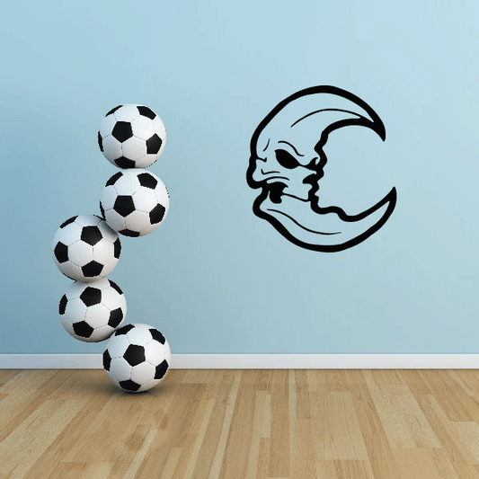 Moon skull face decal with black outline and pale blue moon background