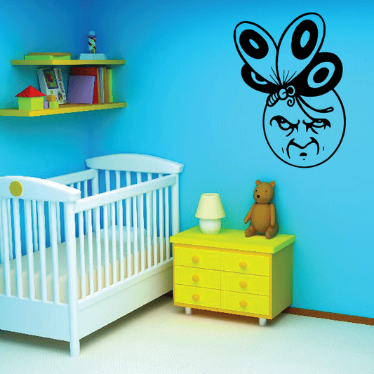 Moon-shaped butterfly face wall decal with black outline and bow details