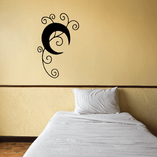 Black moon wall decal with decorative swirls, crescent with spiral center.