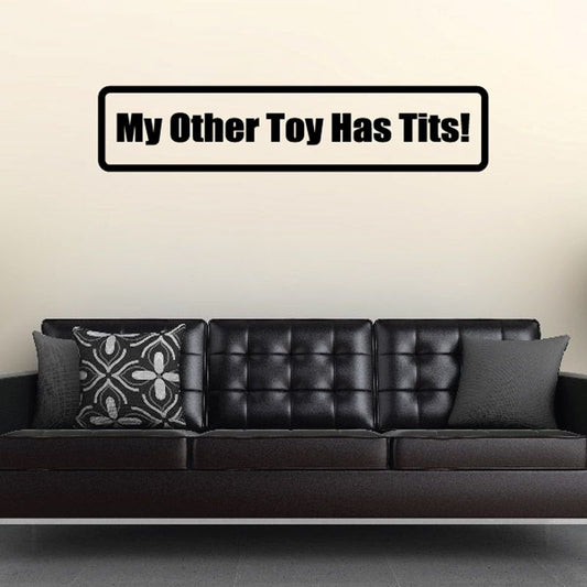Wall decal with bold text: 'My Other Toy Has Tits!'