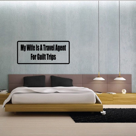 Wall decal text: My Wife Is A Travel Agent For Guilt Trips