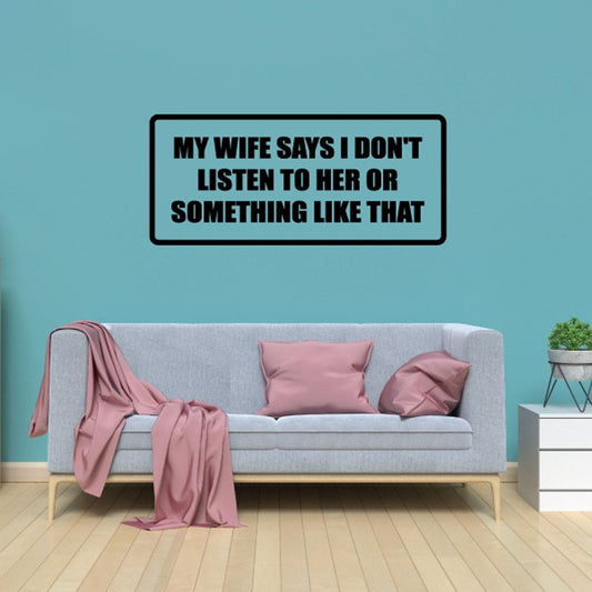 Wall decal with bold text: “My wife says I don't listen to her or something like that”.