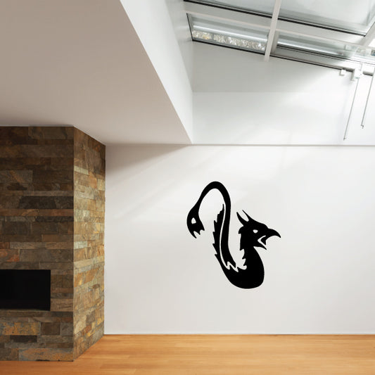 Black sea dragon wall decal with curled tail and fin details.