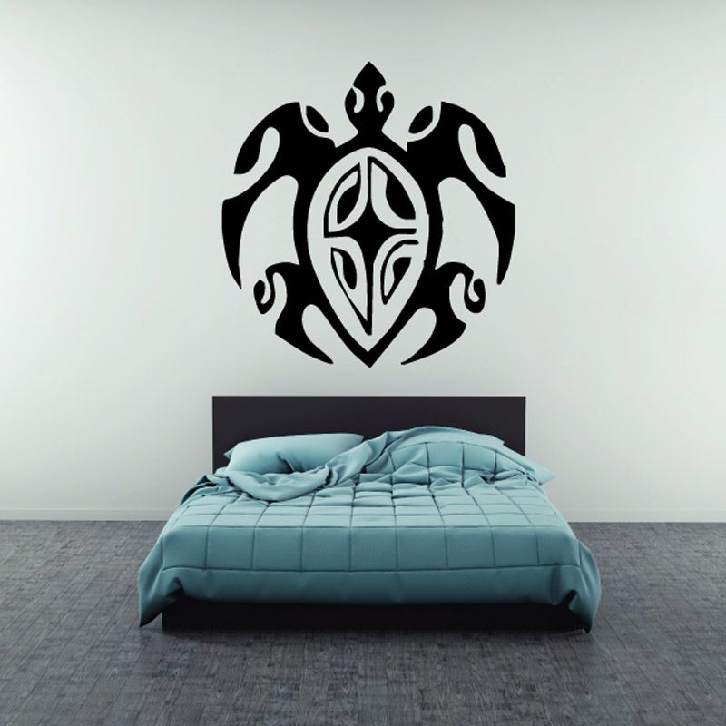 Black stylized sea turtle decal with ornate circular design and teal accents