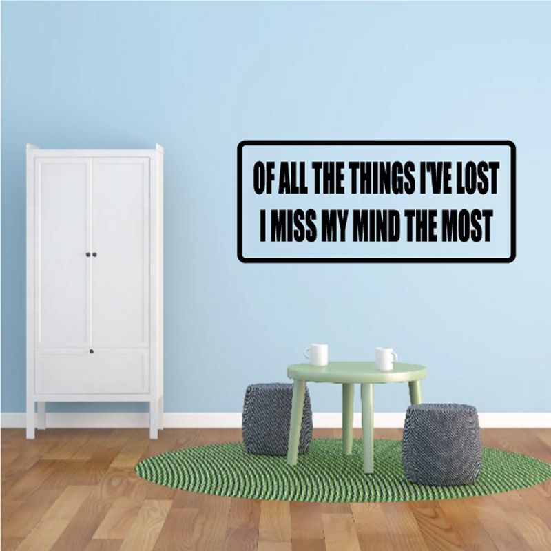 Wall decal with black outline rectangle and bold quote text: 'I miss my mind the most'