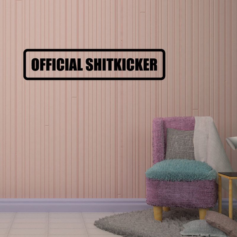 Rectangular wall decal with black border and bold "OFFICIAL SHITKICKER" text