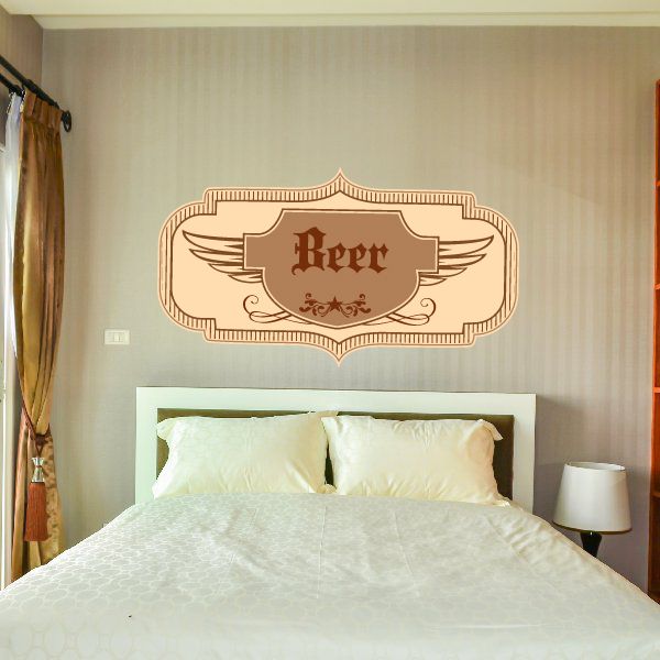 Oktoberfest beer vinyl wall decal with vintage badge and winged “Beer” lettering