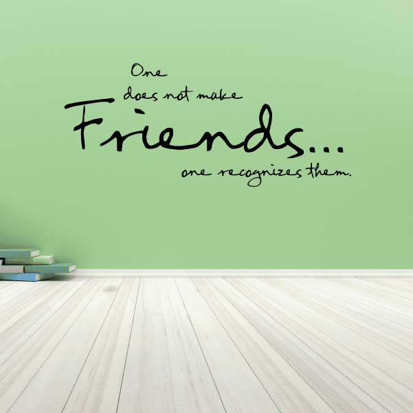 Wall decal with handwritten-style quote: “One does not make friends... one recognizes them.”
