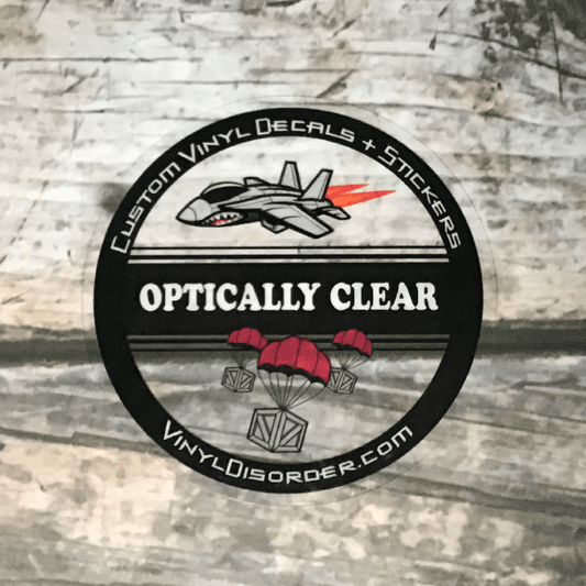 Optically clear vinyl decal sticker with airplane and diamond graphics, round label