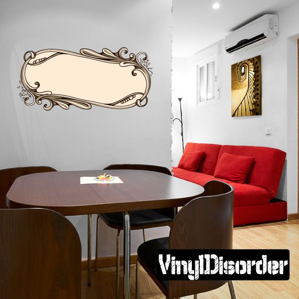 Ornate oval scroll wall decal with decorative flourishes, tan/gold outline