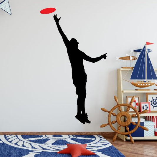 Frisbee wall decal with black silhouette reaching and red frisbee detail