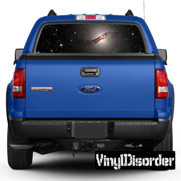 Truck rear window space graphic with dark starfield and glowing nebula