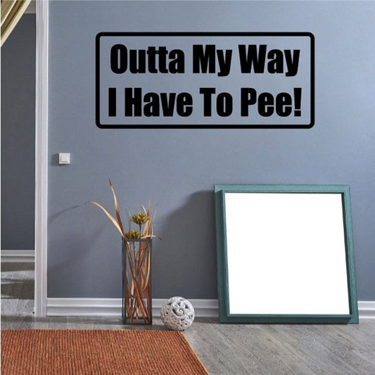 Wall decal reading 'Outta My Way I Have To Pee!'