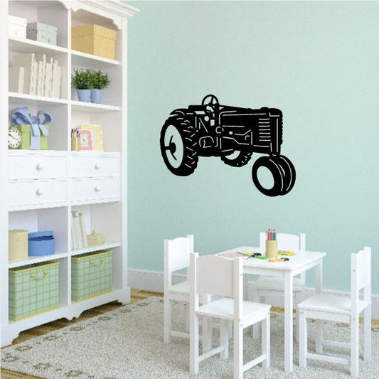 Tractor wall decal featuring a black parked tractor outline