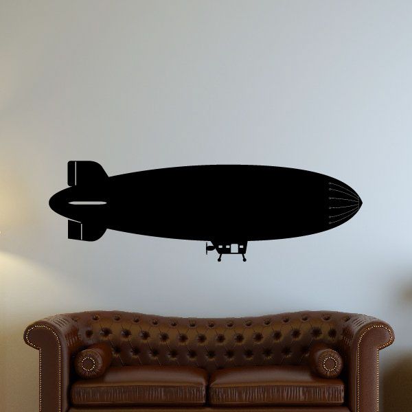 Black blimp airship decal, side view with windows and propeller.