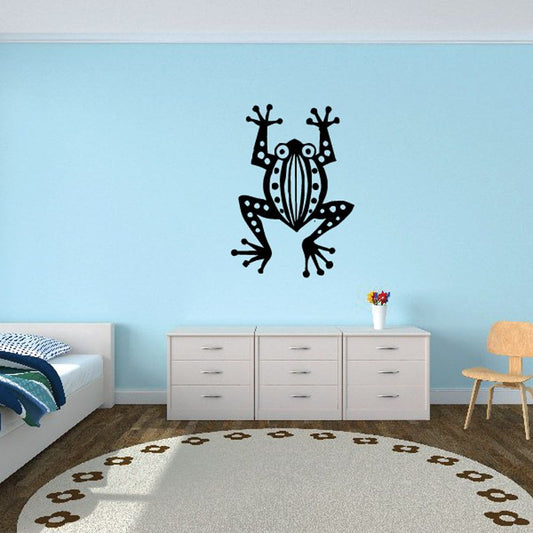 Patterned tree frog wall decal in black and white with polka-dot belly.