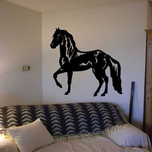 Black horse gaiting silhouette decal, standing with raised leg