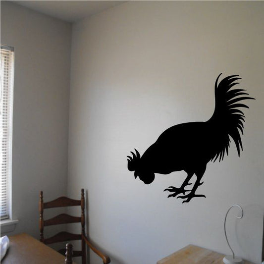 Black rooster silhouette wall decal, pecking stance with spread tail.