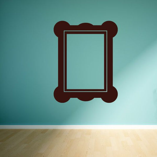 Brown ornate picture frame decal with inner square opening
