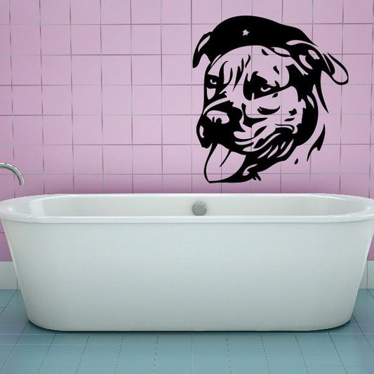 Pit bull face decal with hat, black and white graphic on wall above bathtub