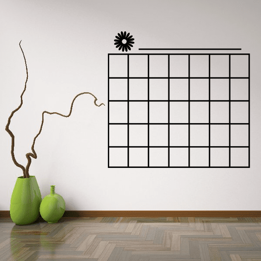 Monthly calendar wall decal with flower accent, black grid and header