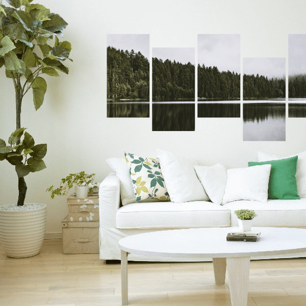 Wall series of panel sticker featuring a custom design in a living room setting with a white couch