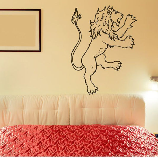 Pouncing lion decal with black line-art mane and raised tail