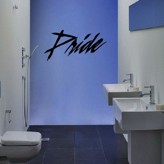Pride decal featuring black cursive Pride lettering on a blue surface.