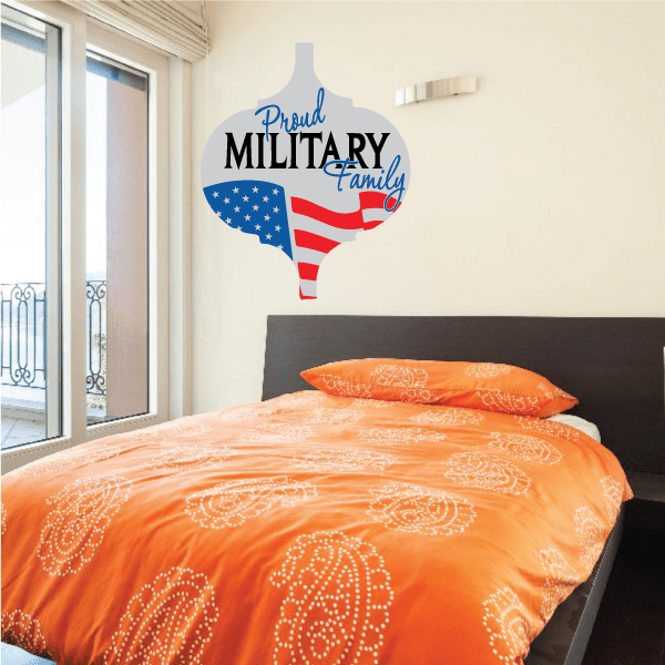Texas-shaped ornament sticker reading "Proud Military Family" with blue, red flag
