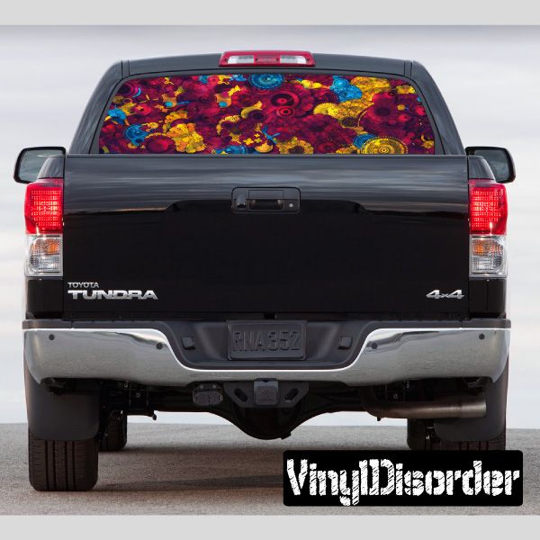 Rear window graphic panel with colorful psychedelic pattern on truck back glass
