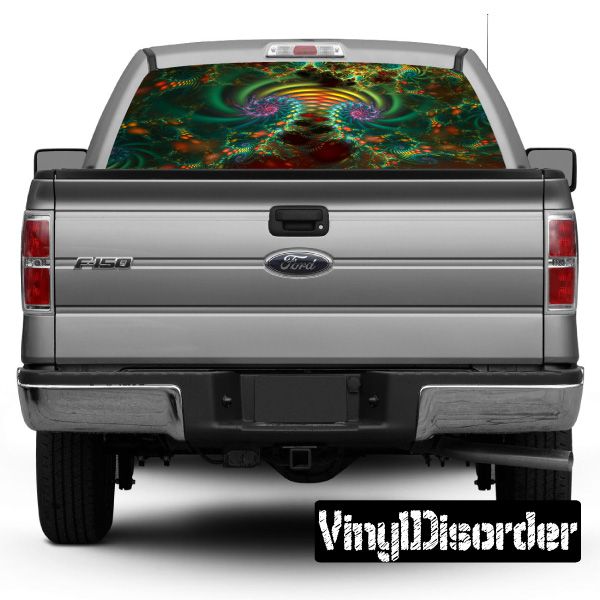 Psychedelic rear window graphic with multicolor abstract design on dark car
