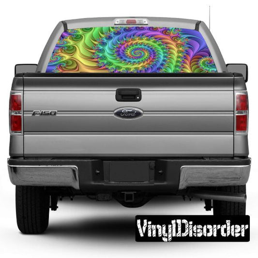 Colorful psychedelic rear window graphic with purple and green swirl pattern on dark car