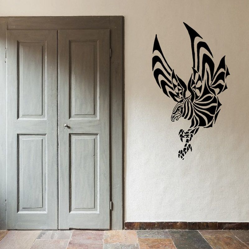 Black tribal eagle wall decal with stylized wings and tail points